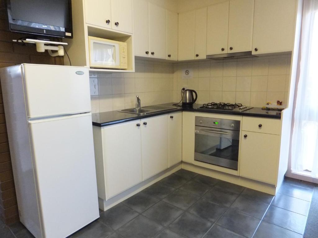 Paradise Holiday Apartments Lake Bunga Room photo